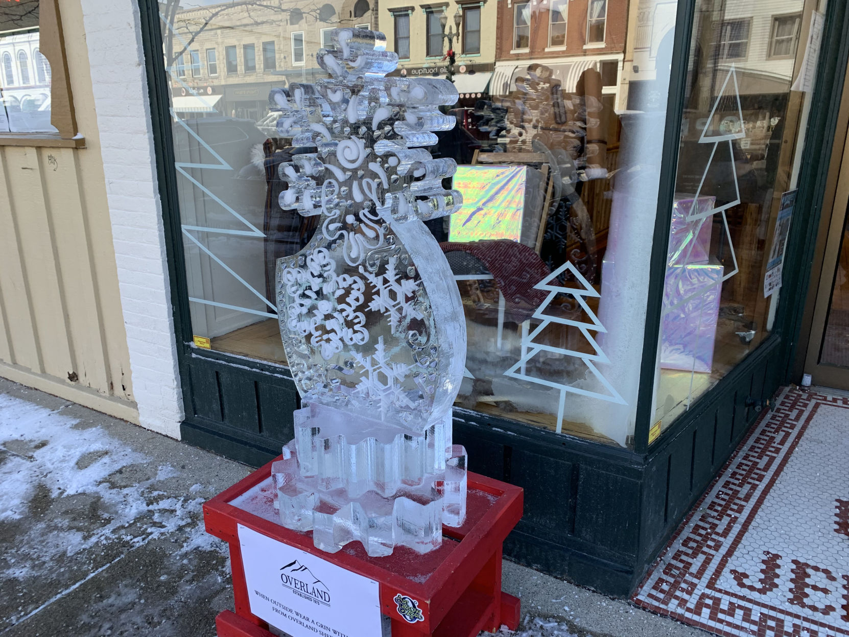 Overland clothing store had a wintry-themed ice sculpture featured outside of its business